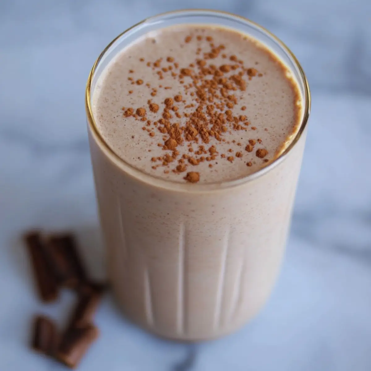 Vanilla almond spiced chai protein smoothie with cinnamon and almond butter